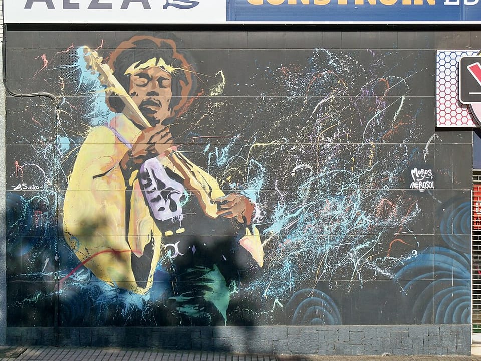Mural of Jimi Hendrix playing guitar